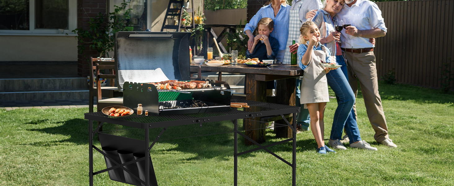 WildFinder 4x2 FT folding grill table at a backyard barbecue with a family