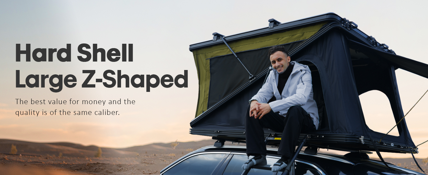 WildFinder hard shell large Z-shaped rooftop tent on a vehicle at sunset