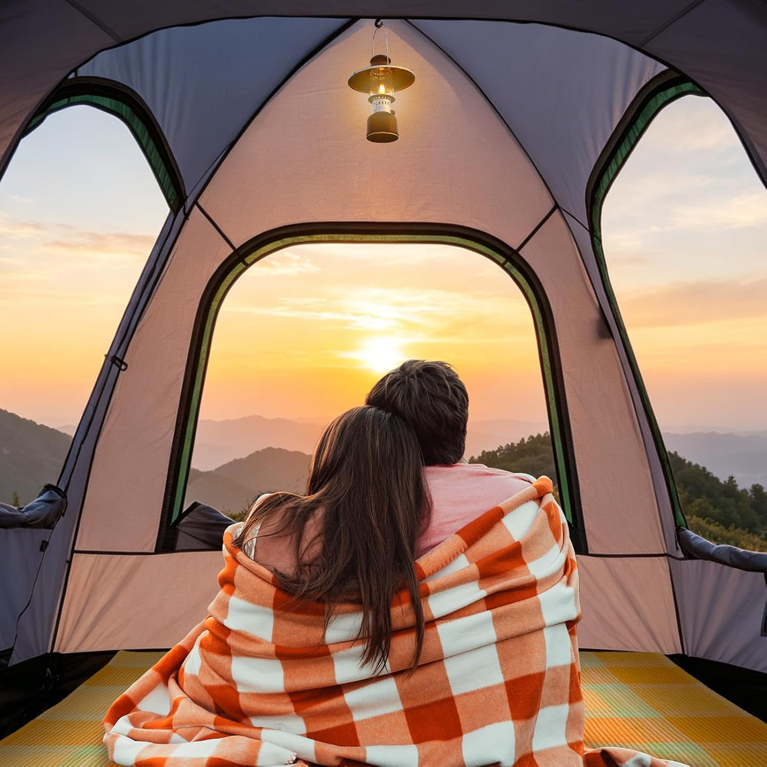 WildFinder dome SUV tent interior with a couple watching the sunset