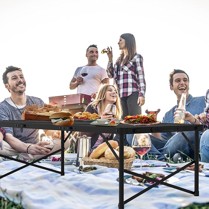 WildFinder 4x2 FT folding table used by friends at an outdoor picnic