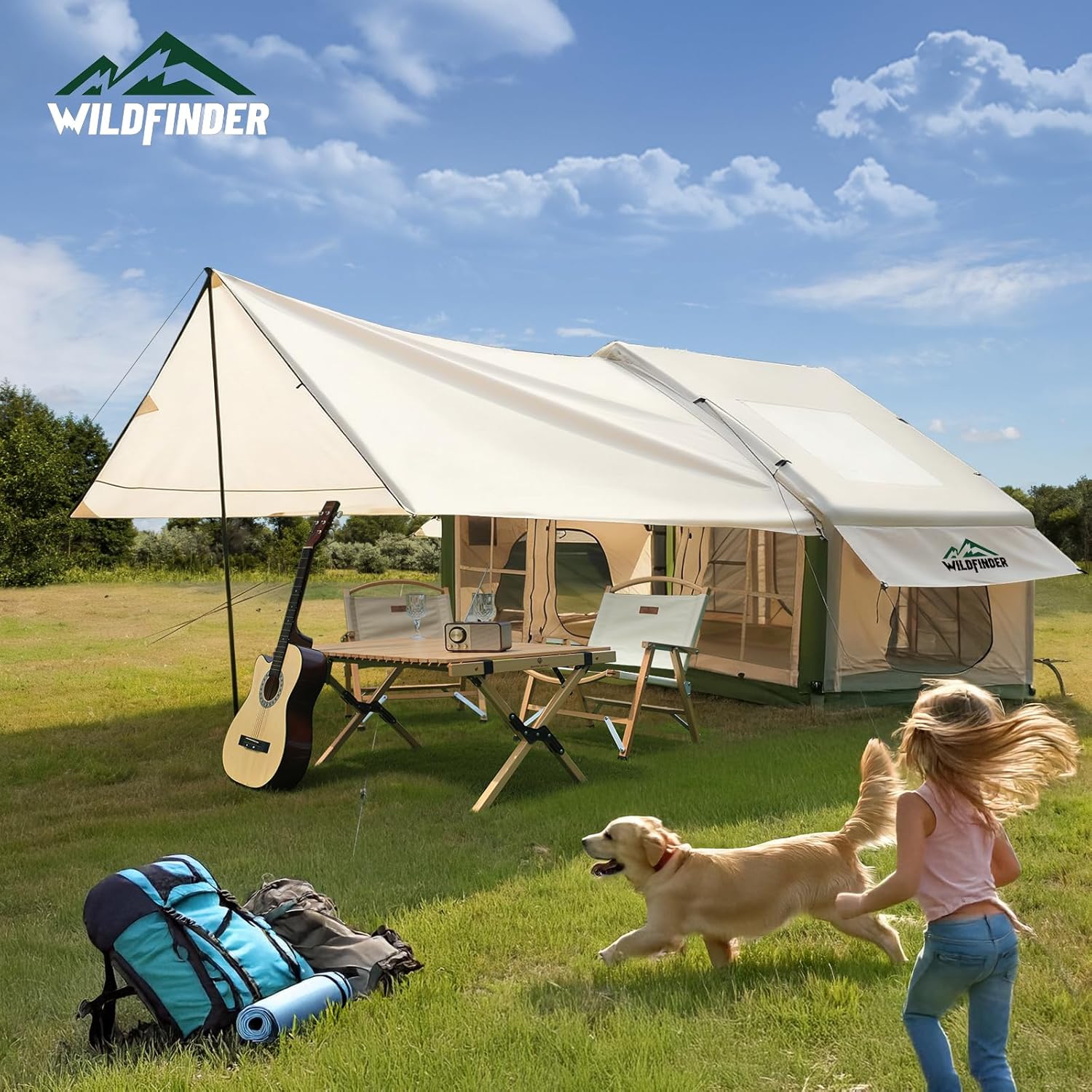 WildFinder green inflatable tent with the awning propped up as a shade canopy