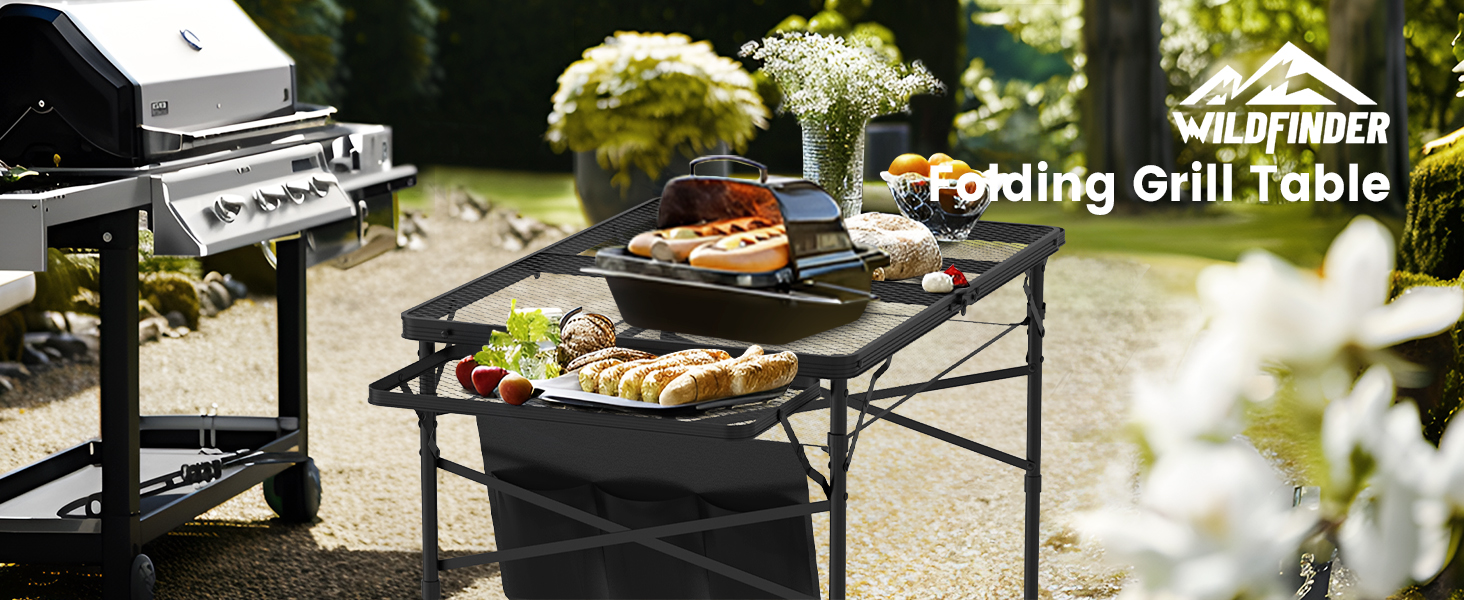 WildFinder folding grill table set with food next to a barbecue