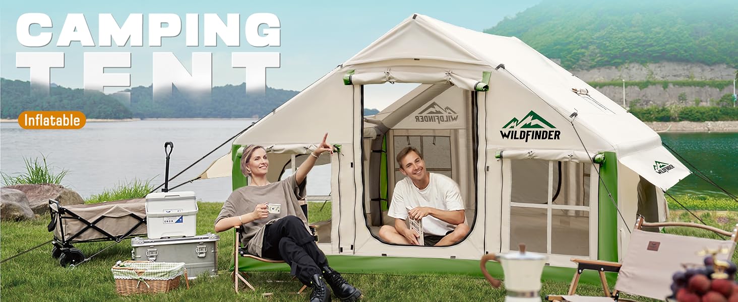 WildFinder green inflatable camping tent by a lake with people relaxing